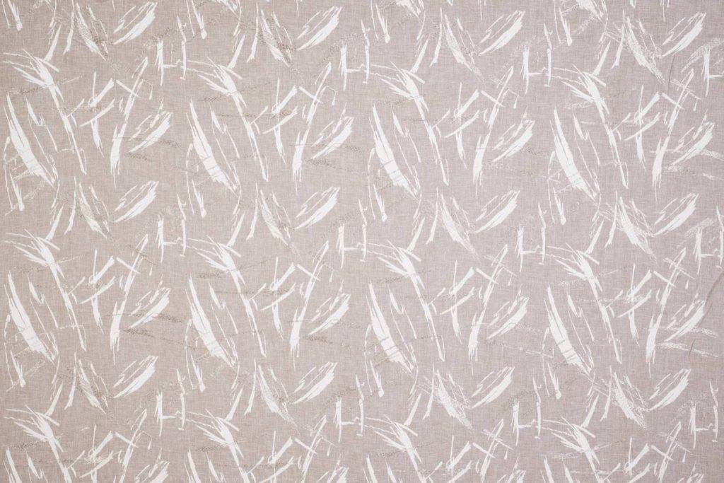 A flat screen shot of the Bassi curtain fabric in Linen by Ashley Wilde