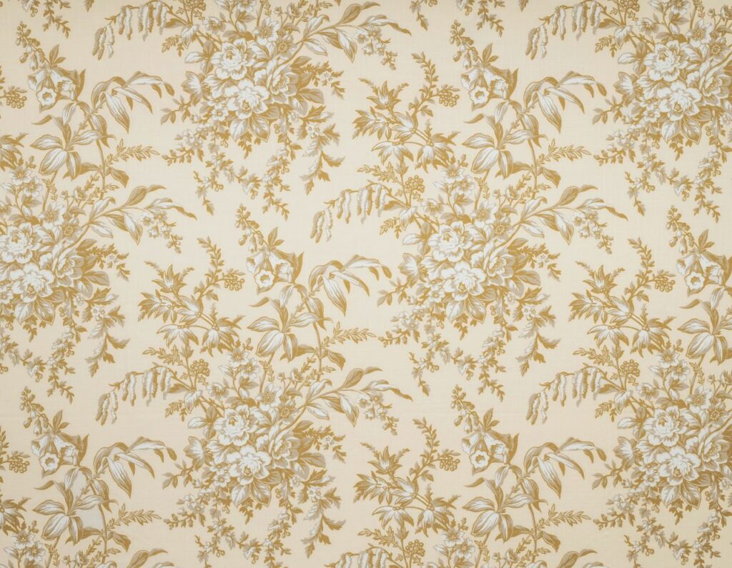 A flat screen shot of the Picardie curtain fabric in Ochre by Laura Ashley 